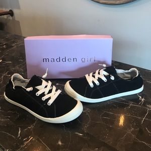 Black & White slip on sneakers. Never been worn.